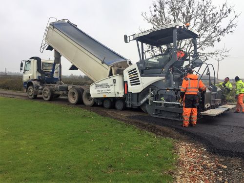 Click Here To Enlarge This Photo Of Two  VOGELE 18-03-3i Pavers are a welcome addition to an impressive fleet 
